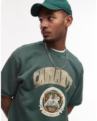 Carhartt - Library - sweat-shirt à manches courtes avec motif graphique - vert délavé - Lyst