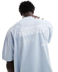ASOS - T-shirt oversize azzurra con scritta stampata sul retro - Lyst