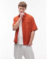 TOPMAN - Camisa Color Óxido De Manga Corta Y Corte Cuadrado De Tejido Texturizado De -Rojo - Lyst