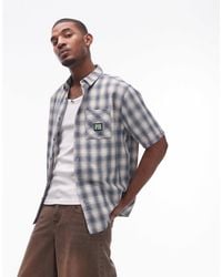 Rip Curl - – raw energy – kurzärmliges, kariertes t-shirt - Lyst