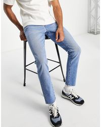 ASOS – jeans mit stretchanteil und schmalem schnitt - Blau