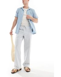ASOS - Pantalon ample à rayures en crépon avec taille élastique - bleu et blanc - Lyst