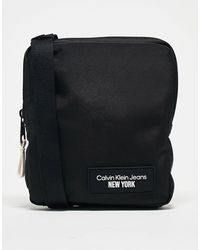 Calvin Klein - Sport essential - borsa a tracolla stile reporter nera - Lyst