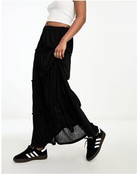 ASOS - Falda larga negra escalonada con diseño texturizado - Lyst