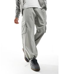 ADPT - Pantalones cargo gris claro sueltos - Lyst