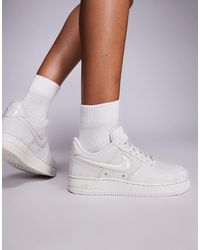 Nike - Air force 1 '07 - baskets avec logo virgule effet bombé - blanc cassé - Lyst