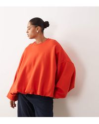 ARRANGE - Curve Bubble Hem Sweatshirt - Lyst