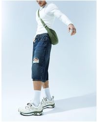 ASOS - Pantaloncini di jeans taglio molto lungo con abrasioni lavaggio scuro vintage - Lyst
