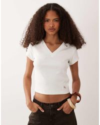 Calvin Klein - Woven Label Rib V Neck Top - Lyst
