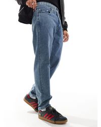 Tommy Hilfiger - – isaac – schmal zulaufende jeans - Lyst