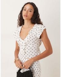 Mango - Blusa Corta A Pois Con Volant - Lyst