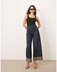 ARRANGE - Parker - jean ample à taille haute et revers - indigo - Lyst