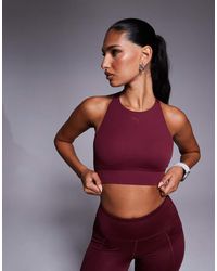 PUMA - Shapeluxe High Neck Sports Bra - Lyst
