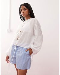 Weekday - Cotton Voile Blouse With Volume Sleeves And Keyhole Front Detail - Lyst
