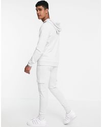 tracksuits white