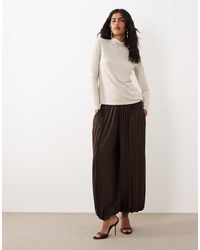 Iyal - Jersey Cuffed Balloon Leg Trousers - Lyst