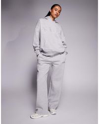 Kaiia - Cotton Rich Embroidered Logo Wide Leg Sweatpants - Lyst