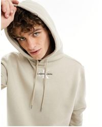 Calvin Klein - Sweat à capuche avec logo monogramme - fauve - Lyst