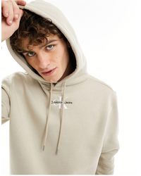 Calvin Klein - Sudadera color topo con capucha y logo - Lyst
