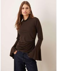 Mango - Roll Neck Long Sleeve Top With Flared Sleeves - Lyst