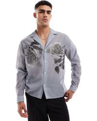 ASOS - Chemise décontractée avec col à revers et imprimés fleuris placés - Lyst