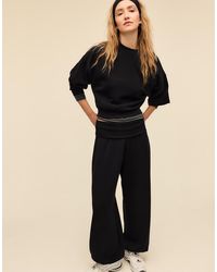 Stradivarius - Joggers A Palloncino Morbidi Al Tatto Neri Con Risvolto - Lyst