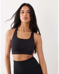Gina Tricot - Mix And Match Cross Over Back Soft Yoga Sports Bra Top - Lyst