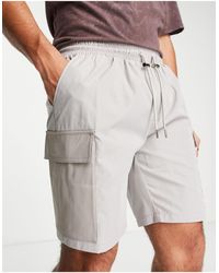 Hombre Ropa de Pantalones cortos de Bermudas cargo Pantalones cortos es cargo Mennace de hombre de color Gris 