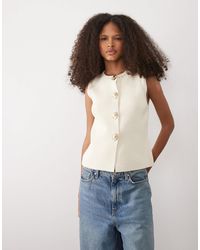Mango - Knitted Vest With Sun Statement Buttons - Lyst
