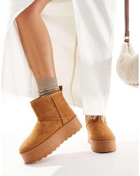 SEQWL - Botas Color Tostado Con Plataforma Plana De -Beis Neutro - Lyst