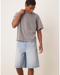 ASOS - Pantalones Cortos Vaqueros De Corte Alargado Con Lavado Azul Medio, Lazada Anudada Y Bolsillos Traseros Bordados De - Lyst