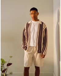TOPMAN - – langärmliges, gestreiftes polohemd aus strick - Lyst