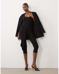 Missy Empire - Slinky Halterneck Drape Tie Waist Detail Capri Trouser Jumpsuit - Lyst