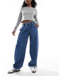 ASOS - Elegante Jeans Met Wijde Ronde Pijpen En Gestrikt Ceintuur - Lyst
