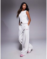 Kaiia - Cotton Rich Embroidered Wide Leg Pintuck Trackies - Lyst