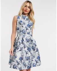 Chi Chi London Avondjurk Met Open Achterkant - Blauw