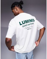 River Island - Oversized T-Shirt With Luminis Back Print - Lyst