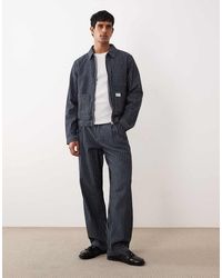 ASOS - Loose Straight Leg Pinstripe Jeans With Pleats - Lyst
