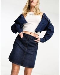 Love Moschino - Mini Denim Skirt With Heart Pocket Detail - Lyst