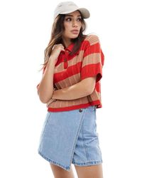 ASOS - Gebreide Polotop Van Vergulde Rib Met Strepen - Lyst