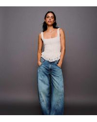 Bershka - Petite Low-rise Barrel Jeans - Lyst