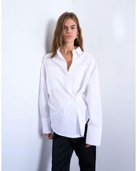 TOPSHOP - Chemise cintrée à manches longues avec patte asymétrique à la taille - Lyst