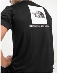 The North Face - Training reaxion redbox - t-shirt nera con stampa sul retro - Lyst