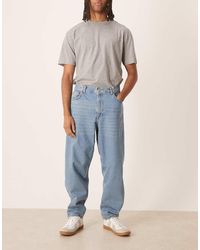 ASOS - Loose Straight Fit Subtle Green Tint Light Wash Jeans - Lyst