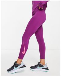 Nike - One dri-fit - leggings alla caviglia a vita medio alta con stampa - Lyst