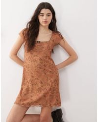 Reclaimed (vintage) - Babydoll Mesh Mini Dress With Bow Detail - Lyst