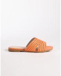 Raid - – coraline – flache slider-sandalen aus bast - Lyst