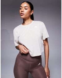 adidas Originals - Adidas training - essentials - t-shirt crop top - beige - Lyst