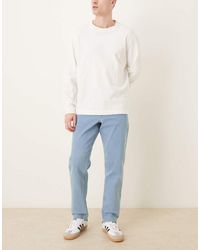 ASOS - Vaqueros Azul Elásticos De Corte Tapered Con Lavado A La Piedra Claro De - Lyst