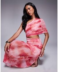 ASOS - Robe longue et asymétrique à imprimé fleuri avec jupe transparente et corsage froncé - rose - Lyst
